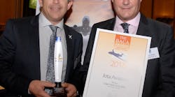 Peter Alfred, Operations Director at Transvalair UK hands the Best Cargo Airline award to Jota Aviation Managing Director Andy Green (left).
