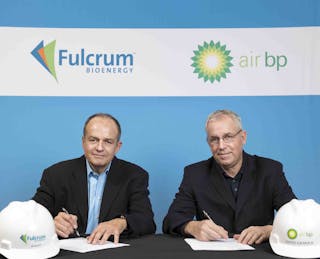 E.James Macias, president and CEO of Fulcrum, left, signs agreement with David Gilmour, vice president technology, commercialisation and Ventures, BP Ventures.
