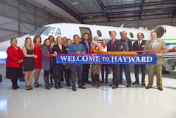 Hayward Mayor Barbara Halliday and Meridian CEO Ken Forester hold the scissors for the ribbon-cutting ceremony at Meridian Hayward&rsquo;s Grand Opening event on December 15, 2016.