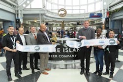 CDA and HMSHost representatives cut a ribbon to celebrate the recent opening of Goose Island bar in Terminal 1 at O'Hare on Dec. 16. CDA and HMSHost representatives cut a ribbon to celebrate the recent opening of Goose Island bar in Terminal 1 at O'Hare on Dec. 16.