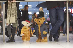 Following the success of the film, Heathrow approached Steiff to bring their hero and heroine to life. Daniel Barth, CEO of Steiff said ‘With a Christmas deadline of just two weeks, our hugely talented teddy bear makers and seamstresses were able to hand-stitch perfect replicas of Mr and Mrs Bair, complete with identical hats, coats and Steiff’s iconic ‘Button in ear’ tag. Following the success of the film, Heathrow approached Steiff to bring their hero and heroine to life. Daniel Barth, CEO of Steiff said ‘With a Christmas deadline of just two weeks, our hugely talented teddy bear makers and seamstresses were able to hand-stitch perfect replicas of Mr and Mrs Bair, complete with identical hats, coats and Steiff’s iconic ‘Button in ear’ tag.