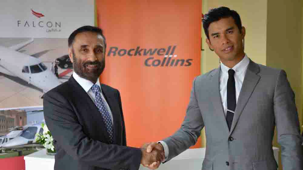 Raman Oberoi, left, COO of Falcon Aviation Services (FAS) with Bernard Stanley of Rockwell Collins. FAS is using ARINC LocalCheck to automate the check-in process for its fleet of helicopters and corporate jets.