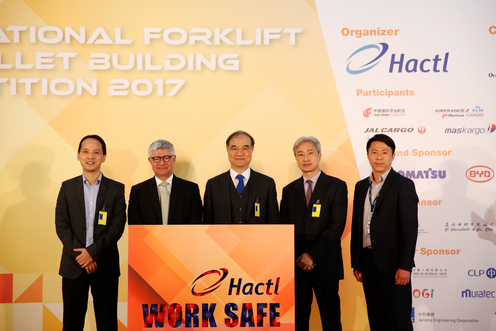 (from left) Occupational Safety and Health Council Principal Consultant Dr Winson Yeung; Hactl Chief Executive Mark Whitehead; Under Secretary for Transport and Housing, Yau Shing-mu; Assistant Commissioner for Labour (Occupational Safety) Wu Wai-Hung and Hactl Executive Director Kenneth Chan launch the 2017 Hactl International Forklift and Pallet Building Competition.
