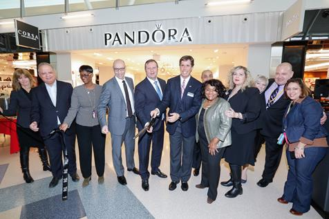 Ribbon cutting in celebration of JFK Terminal 4&rsquo;s new retail openings.