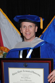 Grad Image Close Up With Diploma 58bf0f0d15676