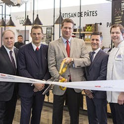 Cutting the ribbon from left to right, Philippe Rainville, president and CEO of A&eacute;roports de Montr&eacute;al; Gianmario Tondato da Ruos, CEO of Autogrill Group; Steve Johnson, president and CEO of HMSHost; Charles Gratton, vice president, real estate and commercial services, A&eacute;roports de Montr&eacute;al; John Pekka Woods, HMSHost director of culinary.
