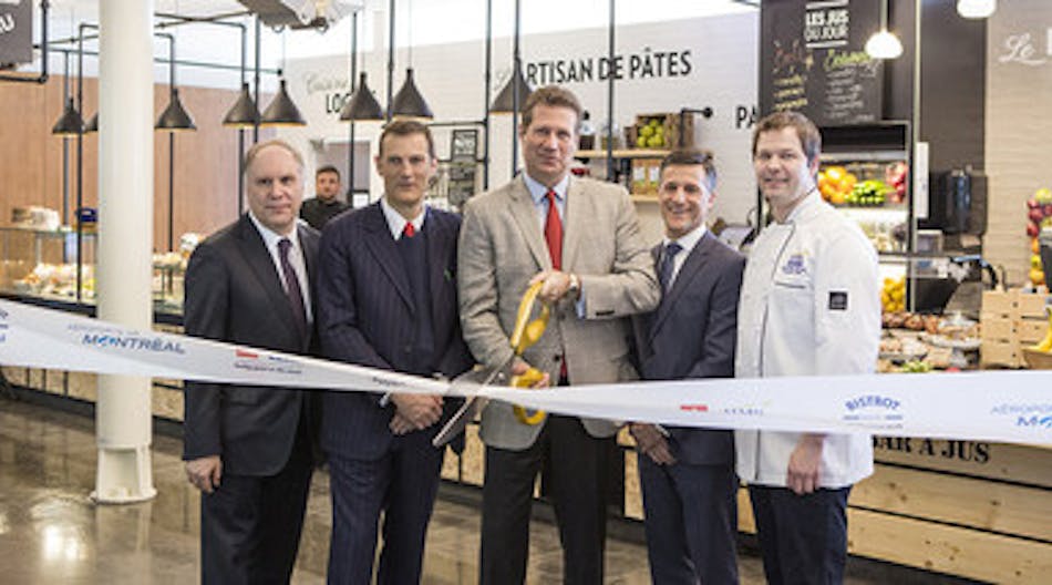 Cutting the ribbon from left to right, Philippe Rainville, president and CEO of A&eacute;roports de Montr&eacute;al; Gianmario Tondato da Ruos, CEO of Autogrill Group; Steve Johnson, president and CEO of HMSHost; Charles Gratton, vice president, real estate and commercial services, A&eacute;roports de Montr&eacute;al; John Pekka Woods, HMSHost director of culinary.