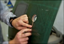 Abaris tech repairs composite panel.