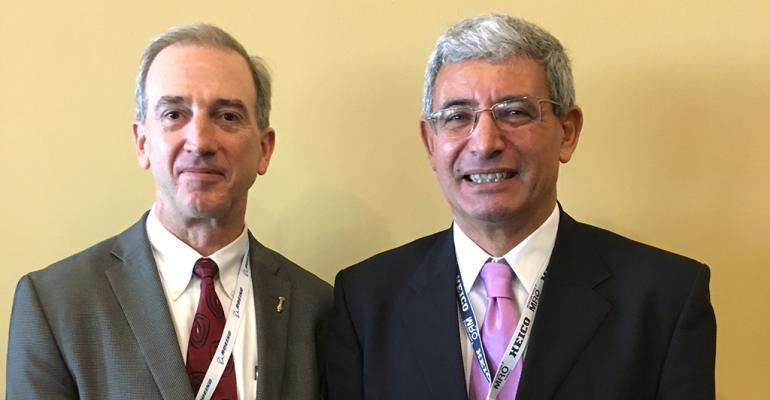 Larry Slate and Hisham Nasser.