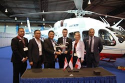 Bell Helicopter and PT Carpediem Mandiri celebrate the delivery with Nancy Lynn McDonald, High Commissioner of Canada to Singapore at Rotorcraft Asia Bell Helicopter and PT Carpediem Mandiri celebrate the delivery with Nancy Lynn McDonald, High Commissioner of Canada to Singapore at Rotorcraft Asia