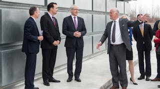 The Honourable Marc Garneau, Minister of Transport joins PortsToronto CEO Geoffrey Wilson and Gene Cabral, Executive Vice President of Billy Bishop Toronto City Airport on a tour of the new Ground Run-Up Enclosure.