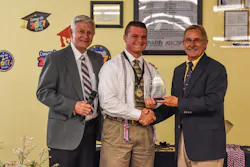 Jensen Houck is pictured with SUN ‘n FUN Chairman of the Board Bob Knight (left) and SUN ‘n FUN President/CEO John “Lites” Leenhouts (right) at CFAA’s end of the year awards ceremony on Monday, May 22, 2017.