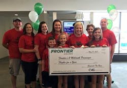 Frontier Airlines thanked their two-millionth CVG passenger, Lori, of Seaman, Ohio, and her guest, with one year’s worth of travel, and free parking provided by CVG. Frontier Airlines thanked their two-millionth CVG passenger, Lori, of Seaman, Ohio, and her guest, with one year’s worth of travel, and free parking provided by CVG.