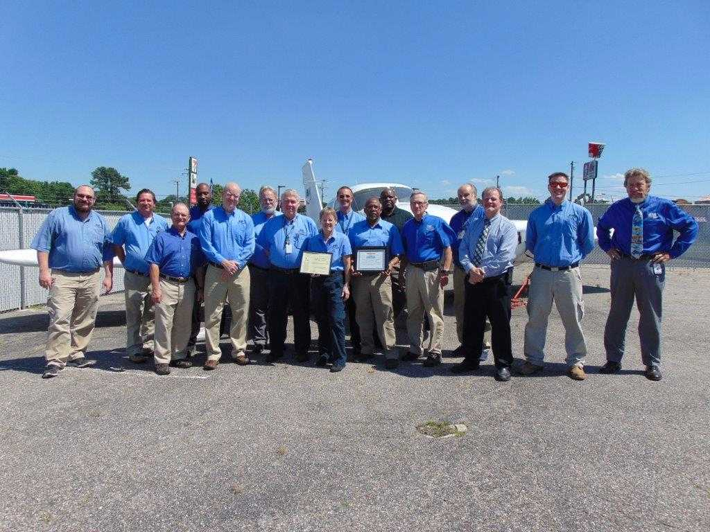 Front Row left-right: Ken Wiley, Ben Thompson, Kurt Gibson, Nancy Jones, Jeremiah Lee, Jerry Snyder, Thomas Schaffer, Tim Murray, Brad Groom. Back Row left-right: David Karnuth, Thomas Stevens, Dominic Cummings, Ric Ryburn, Ken Panissidi, Carl Craig, Dan Burke.