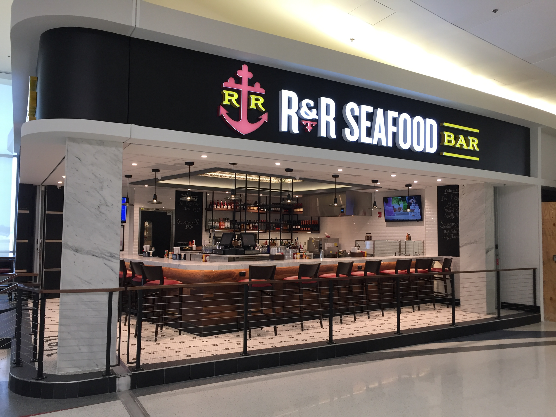 In addition to a full bar offering beer, wine and cocktails, R&R Seafood Bar serves the Crabby Mary, its signature house drink, made with Absolut Peppar vodka in a glass rimmed with Obrycki&rsquo;s spicy seafood seasoning and garnished with a crab claw.