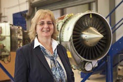 Andrea Weyrich, Manager Maintenance Engine Shop, shown with a TFE731-series engine. Andrea Weyrich, Manager Maintenance Engine Shop, shown with a TFE731-series engine.