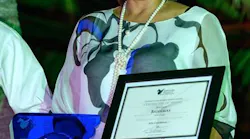 Director General in The Bahamas Ministry of Tourism and Aviation, Joy Jibrilu, accepting the award.