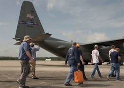 Students and faculty members from the Aviation Institute of Maintenance school tour the Dobbins flightline June 23, 2017. The students walked around a C-130H3 Hercules parked on the flightline before heading into a hangar to get a firsthand look at one undergoing maintenance. Students and faculty members from the Aviation Institute of Maintenance school tour the Dobbins flightline June 23, 2017. The students walked around a C-130H3 Hercules parked on the flightline before heading into a hangar to get a firsthand look at one undergoing maintenance.