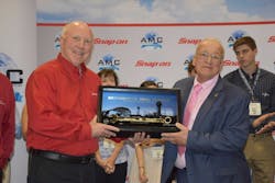 John Goglia receives the Golden Wrench Award from Snap-on&apos;s Tom Murray at the AMC in Orlando.