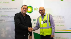 Mark Maclean, assistant general manager operations services – Cape Town, Airports Company of South Africa, left, and Anthony Leon, general manager, Air BP Southern Africa shake hands on the take over.