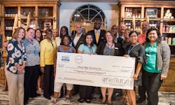 Representatives from HMSHost Foundation, HMSHost Corporation, Charlotte Douglas International Airport, and Grace-Mar Services Inc. surrounded by HMSHost associates. Representatives from HMSHost Foundation, HMSHost Corporation, Charlotte Douglas International Airport, and Grace-Mar Services Inc. surrounded by HMSHost associates.