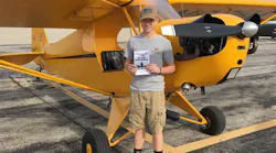 In flight between Mobile and Oshkosh. Last leg before arriving at KOSH. That NOTAM (Notice to Airmen) is thick, but gives all the information that is essential for a safe arrival to AirVenture.