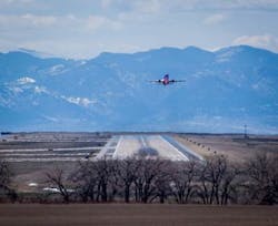 An aircraft departs runway 8/26 at Denver International Airport. An aircraft departs runway 8/26 at Denver International Airport.