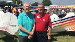 Frank Christensen (left), shared a moment with IAC President Mike Heuer at AirVenture this summer.