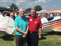 Frank Christensen (left), shared a moment with IAC President Mike Heuer at AirVenture this summer. Frank Christensen (left), shared a moment with IAC President Mike Heuer at AirVenture this summer.