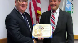 H Matthew Simpson FAA Safety Team lead representative presented M Richard Mellon with its Wright Brothers Master Pilot Award 596cba1e4867a