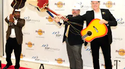 Capping the rollout of an expansive and exciting new lineup of dining and shopping choices at Bush Airport, representatives from the airport system, Hard Rock International and operator and manager, SSP America, were on hand and capped the celebration with a ceremonial “guitar smash.”