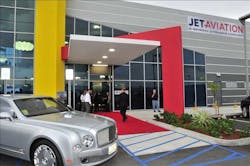 The red carpet leads to the entrance to the new FBO where guests were welcomed by staff in tuxedos and evening gowns. The red carpet leads to the entrance to the new FBO where guests were welcomed by staff in tuxedos and evening gowns.