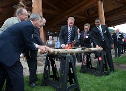 Log cutting ceremony: (left to right) CFO of Cutter Aviation Steve Prieser, Director of Special Projects of Cutter Aviation Mike Livezey, Colorado Springs Mayor John Suthers, CEO of Cutter Aviation Will Cutter, Colorado Springs Director of Aviation Greg Phillips, Cutter Aviation Colorado Springs General Manager Calvin Martin. Log cutting ceremony: (left to right) CFO of Cutter Aviation Steve Prieser, Director of Special Projects of Cutter Aviation Mike Livezey, Colorado Springs Mayor John Suthers, CEO of Cutter Aviation Will Cutter, Colorado Springs Director of Aviation Greg Phillips, Cutter Aviation Colorado Springs General Manager Calvin Martin.