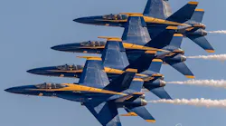 The US Navy Blue Angels diamond in a tight, close-formation pass. The Blue Angels Demonstration Team will headline the 2017 Wings Over North Georgia Air Show.