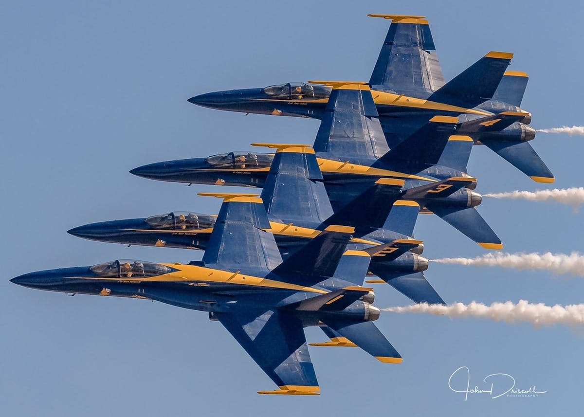 The US Navy Blue Angels diamond in a tight, close-formation pass. The Blue Angels Demonstration Team will headline the 2017 Wings Over North Georgia Air Show.