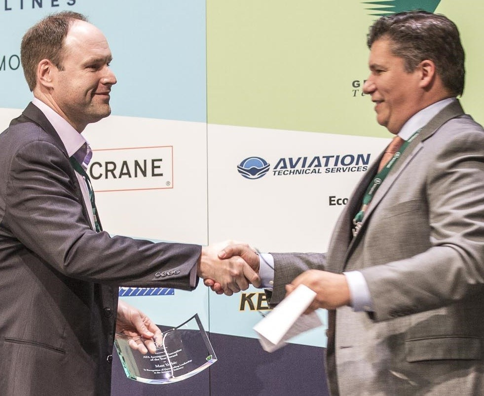 Matt Yerbic CEO of ATS, receives AFA Aerospace Executive of the Year Award from Bill McSherry, Vice President, Boeing.