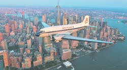 The Breitling DC 3 flies over New York city on it&apos;s world tour.
