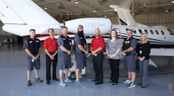 Members of Duncan Aviation's CJ3 team pose with another upgraded aircraft just before it delivers to an excited operator.