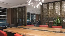 A business zone featuring a custom crafted work table, by Live Edge Design of Duncan, BC created with wood salvaged from a maple tree in the Cowichan Valley which had come to the end of its natural life.