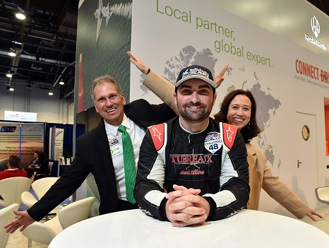 Air BP&rsquo;s Chris Humes, performance unit leader, Americas and Irene Lores, global marketing director, General Aviation welcome Kevin Coleman, Red Bull Air Race Challenger Class pilot to their stand at NBAA-BACE.