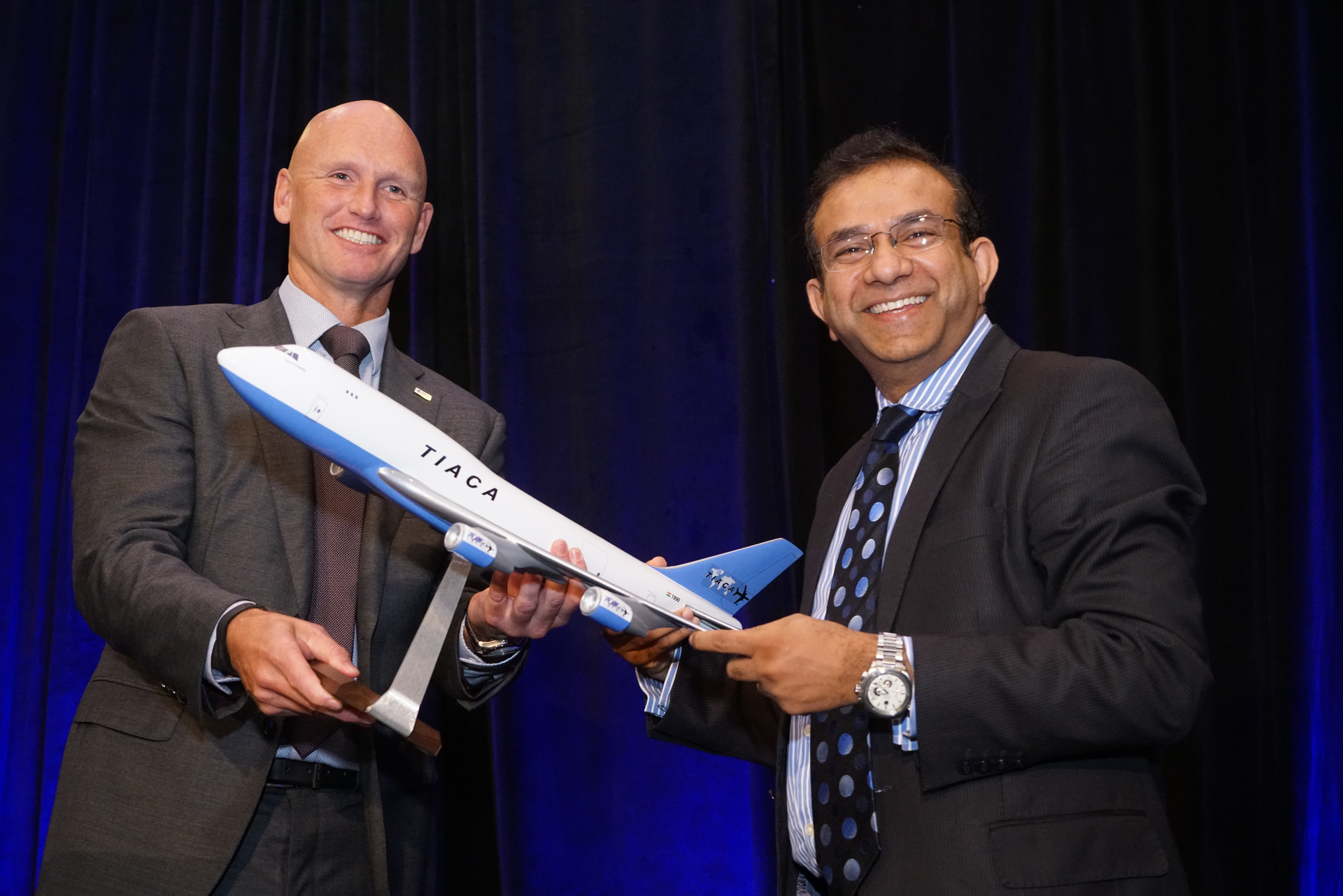 Incoming Chairman Sebastiaan Scholte thanks outgoing Chairman Sanjiv Edward at TIACA's Executive Summit in Miami, Florida