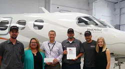 Elizabeth Penuela, NVOC Assistant Principal Operations pictured with Clay Lacy Mechanics Ivo Vissers, Alfredo Gonzalez and Albert Martinez, Scott Cutshall, Clay Lacy VP Brand Development and Laura Hockemeyer, Marketing Manager.