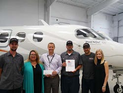 Elizabeth Penuela, NVOC Assistant Principal Operations pictured with Clay Lacy Mechanics Ivo Vissers, Alfredo Gonzalez and Albert Martinez, Scott Cutshall, Clay Lacy VP Brand Development and Laura Hockemeyer, Marketing Manager. Elizabeth Penuela, NVOC Assistant Principal Operations pictured with Clay Lacy Mechanics Ivo Vissers, Alfredo Gonzalez and Albert Martinez, Scott Cutshall, Clay Lacy VP Brand Development and Laura Hockemeyer, Marketing Manager.