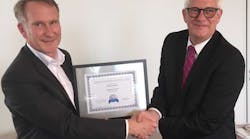 (R-L) Joe Moeggenberg (ARGUS CEO) congratulates Frank Wobith (Safety and Compliance Manager of Premium Jet AG).