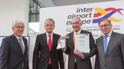Second from right Mr Remo Brunschwiler, CEO of Vanderlande, accepting the award.