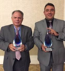 From left: MDAD Assistant Director for Facilities Development Pedro Hernandez and MDAD Civil Environmental Chief Gustavo Leal, with FAC&rsquo;s 2017 J. Bryan Cooper awards