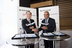 Mr. Wang, Senior Vice President at China Airlines (left) and Paul Lochab, CCO of Satair Group (right) - shaking hands on the new IMS deal that China Airlines just signed for its Airbus fleet.