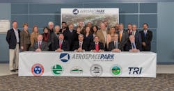 Representatives of the TCAA; the Cities of Bristol, Kingsport and Johnson City, Tennessee; and Sullivan County and Washington County, Tennessee join together to sign the newly passed agreement to support the development of Aerospace Park. Representatives of the TCAA; the Cities of Bristol, Kingsport and Johnson City, Tennessee; and Sullivan County and Washington County, Tennessee join together to sign the newly passed agreement to support the development of Aerospace Park.