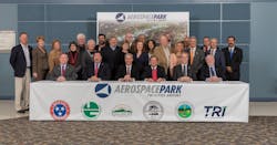 Representatives of the TCAA; the Cities of Bristol, Kingsport and Johnson City, Tennessee; and Sullivan County and Washington County, Tennessee join together to sign the newly passed agreement to support the development of Aerospace Park.