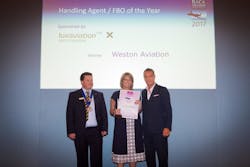 Becky Carver (Managing Director of Weston Aviation) receiving the Award from BACA Chairman Richard Mumford and George Galanopoulos, Managing Director of Luxaviation UK Becky Carver (Managing Director of Weston Aviation) receiving the Award from BACA Chairman Richard Mumford and George Galanopoulos, Managing Director of Luxaviation UK